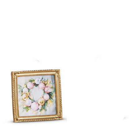 small gold frame art of holiday wreath made of pink and gold bauble ornaments and greenry