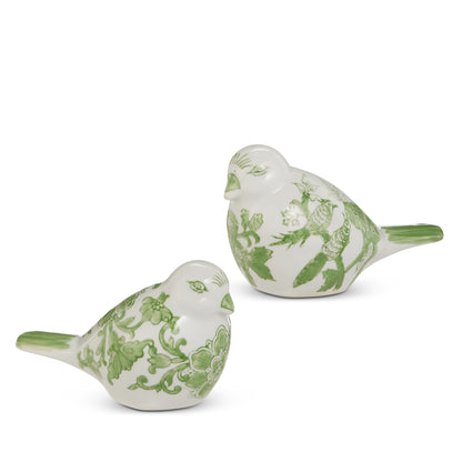 2 white birds with green floral designs shown on a white background