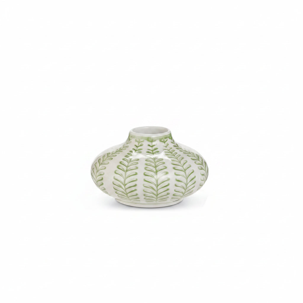 small white bud vase with green geometric leaf design