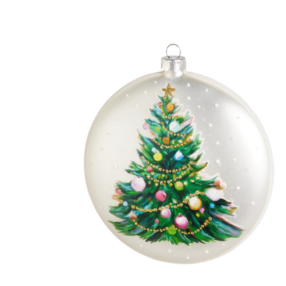 A round clear glass Christmas ornament featuring a green Christmas tree with colorful ornaments and gold garlands painted on it shown on a white background