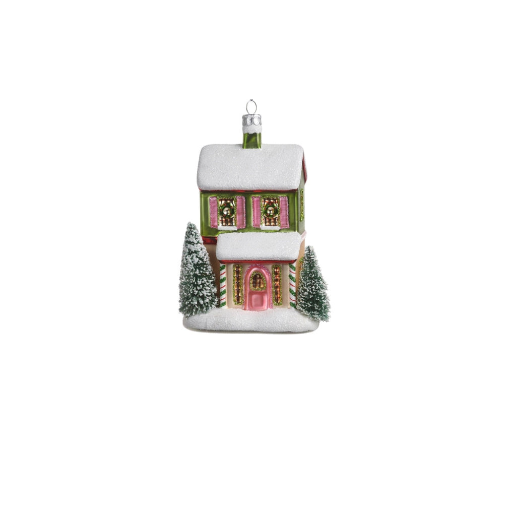 green house ornament with a pink door on a white background