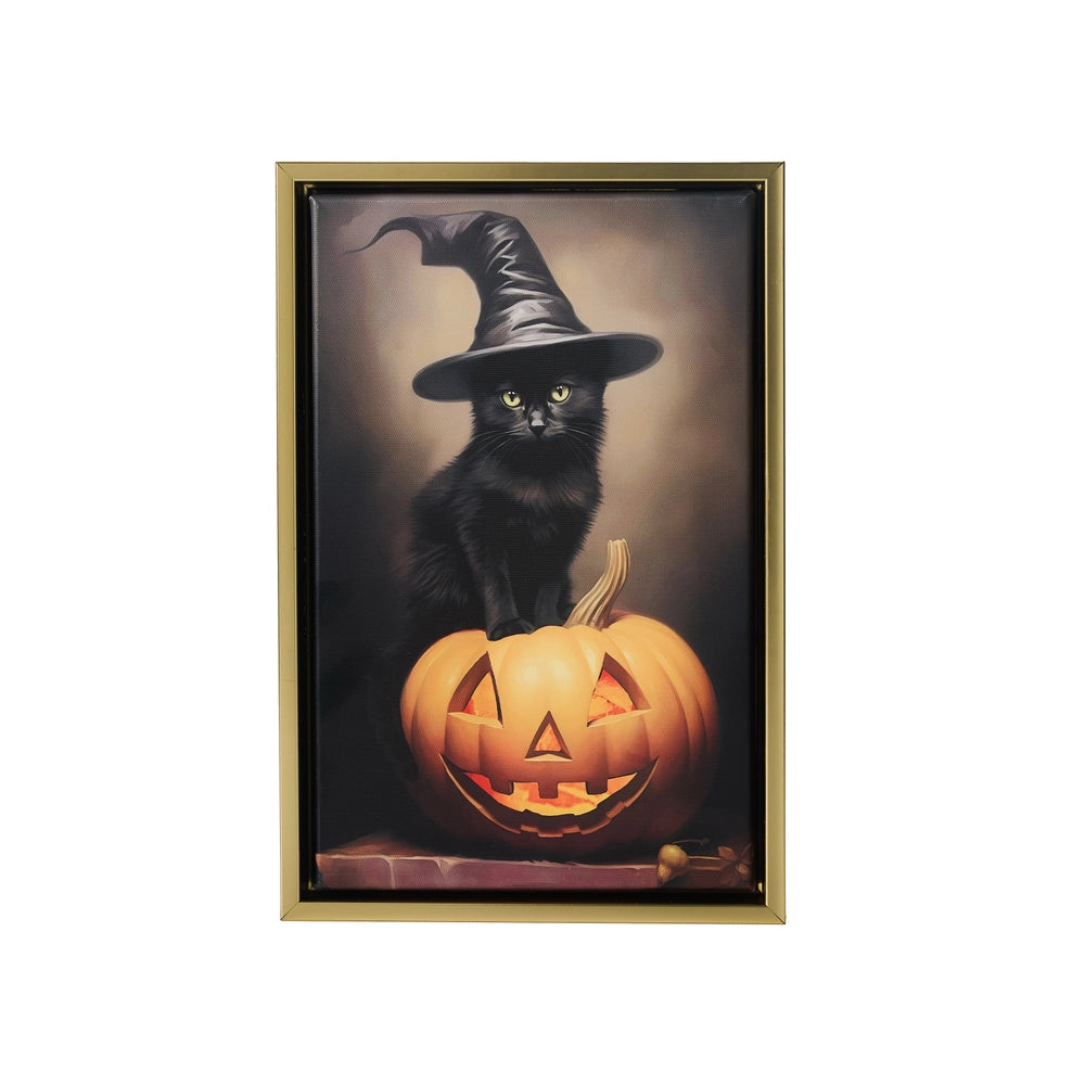 framed art of black cat wearing witch's hat and sitting on a pumpkin