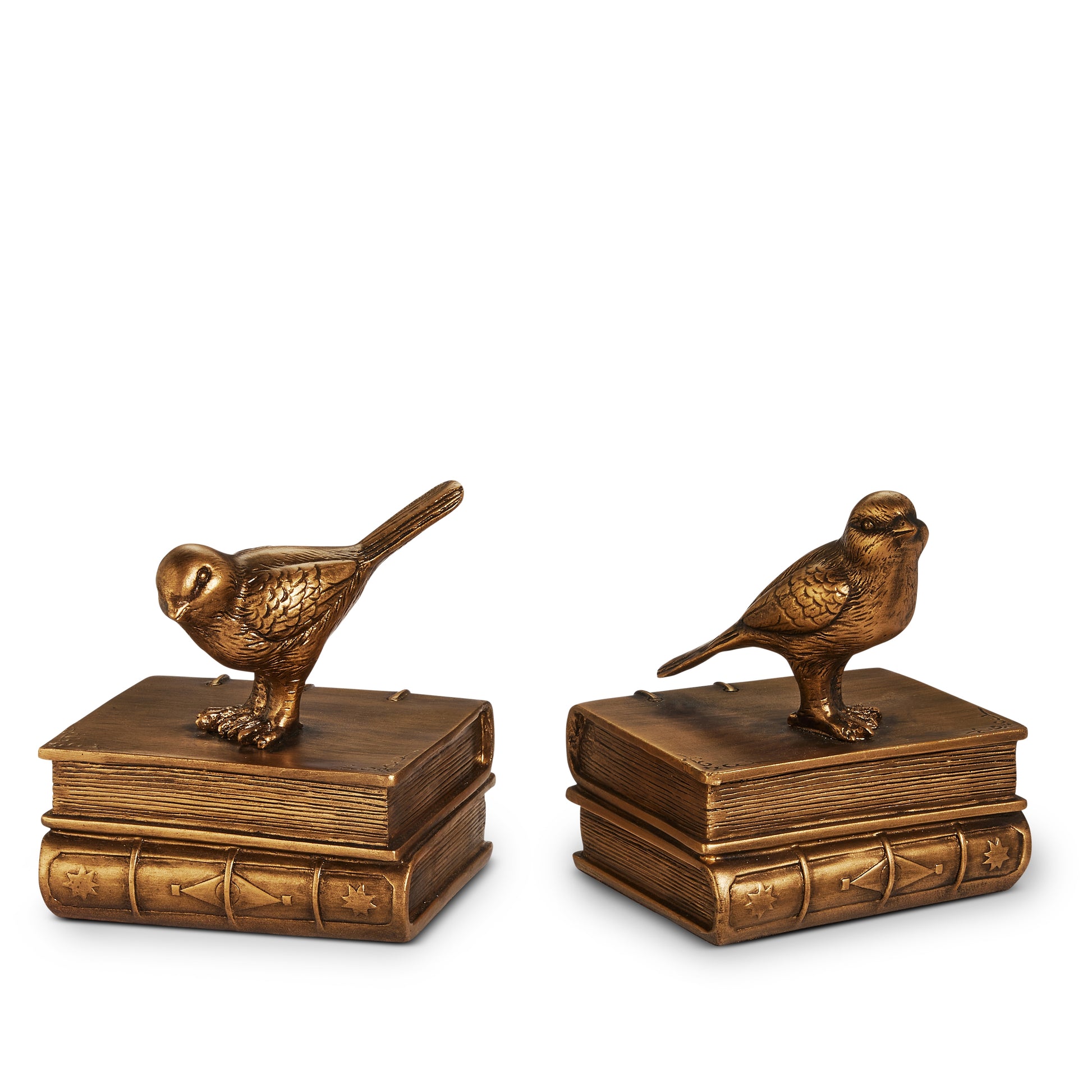set of bookends with gold bird standing on top of 2 gold books 