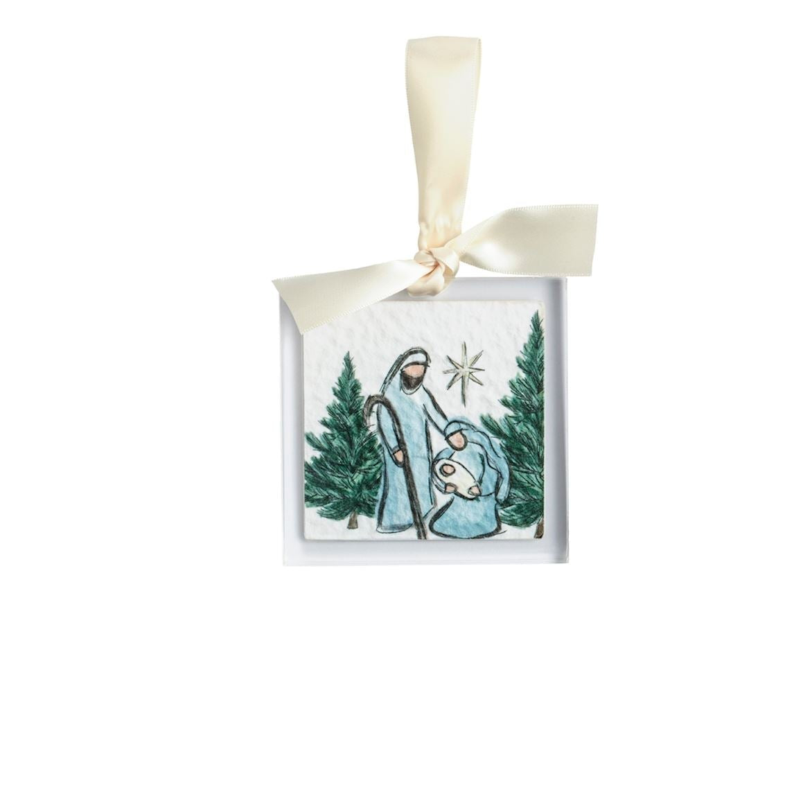 acrylic ornament with image of mary holding baby jesus and joseph standing by them, with trees on each side and a star above them