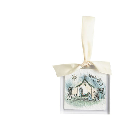 acrylic ornament with image of the nativity scene in a creche with angels and a star above it