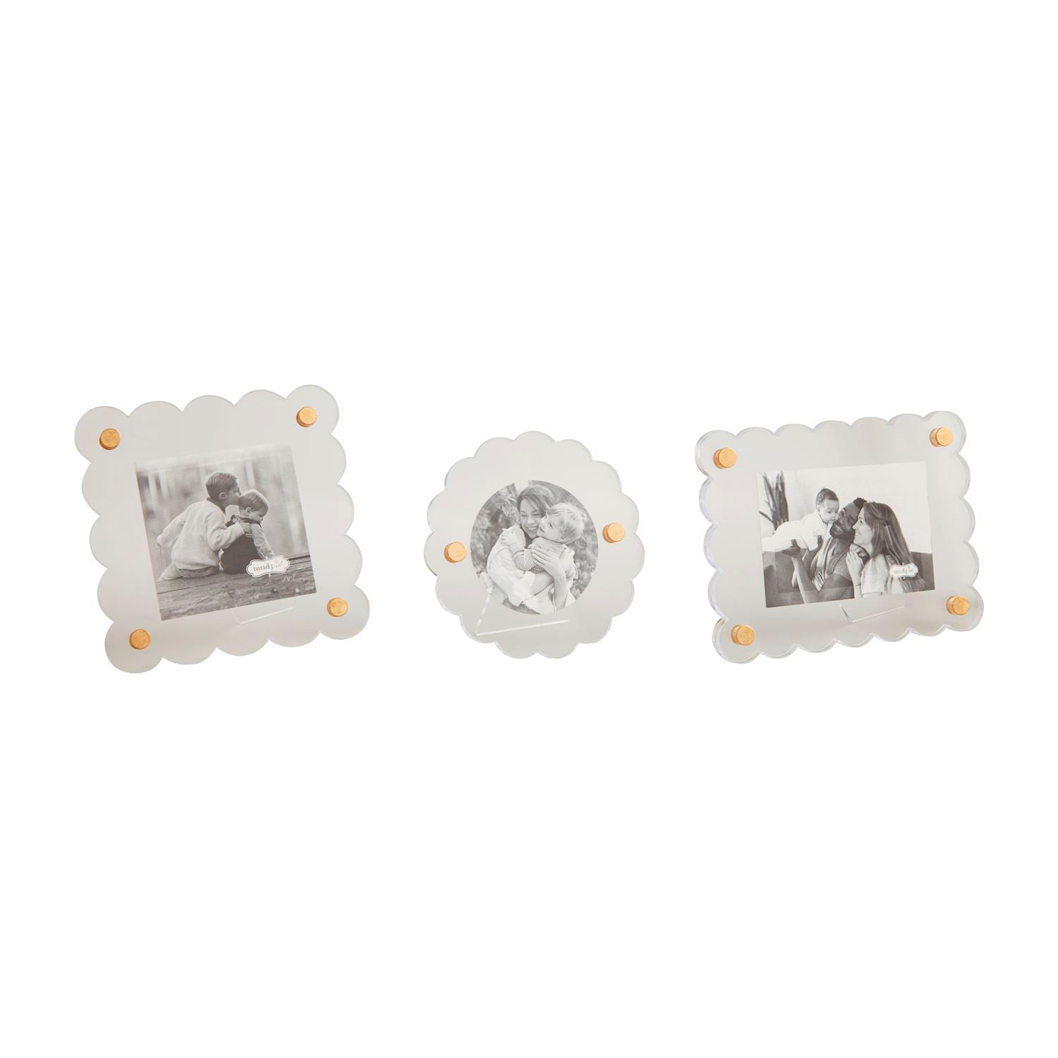 3 assorted acrylic photo frames in a row on a white background