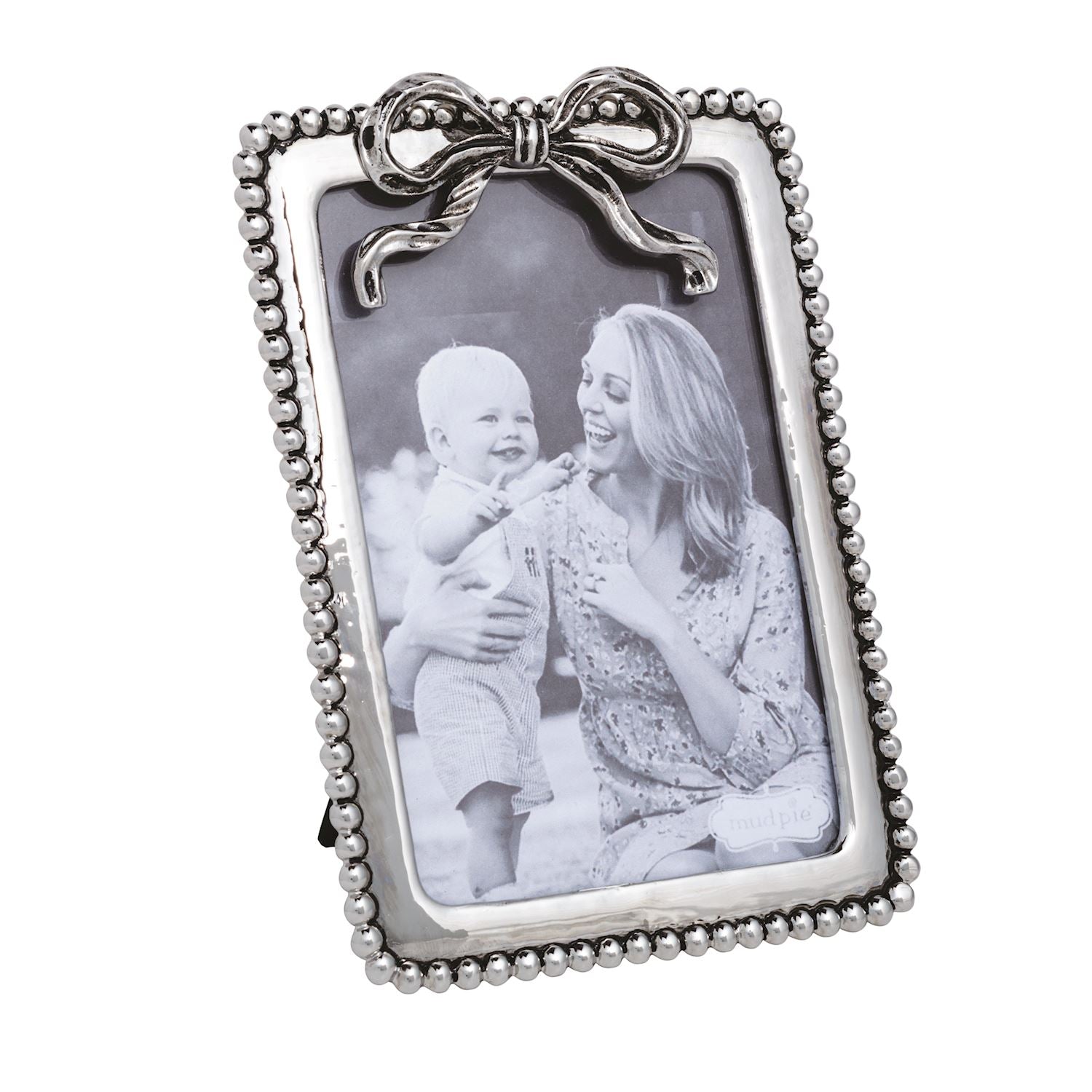 smaller silver horizontal frame with black and white family photo in it