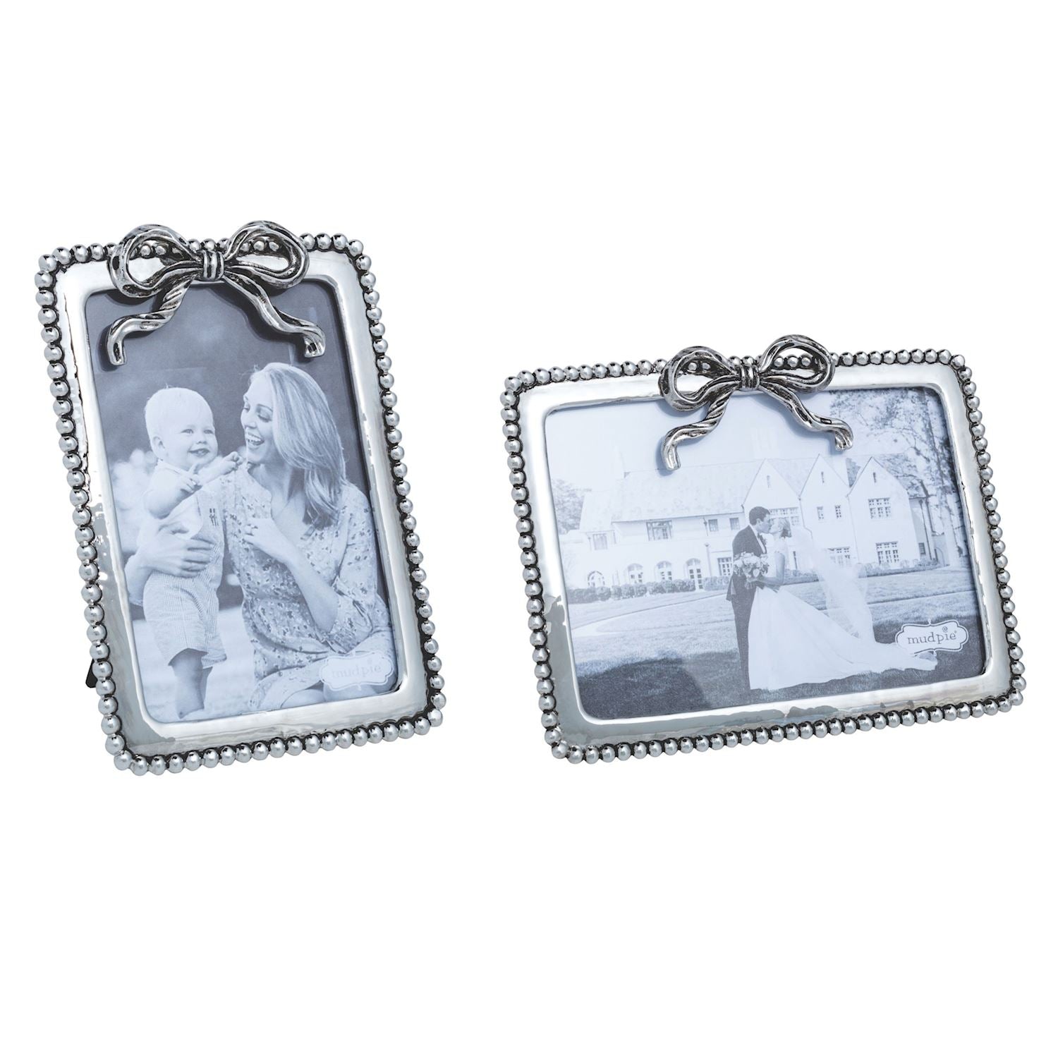 Two silver photo frames with beaded edges and bow on top displaying family photos.