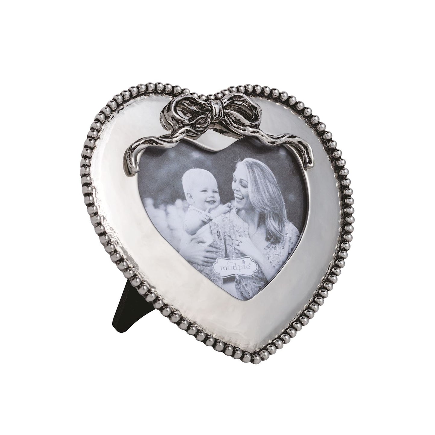 Heart-shaped photo frame with a bow design on a white background