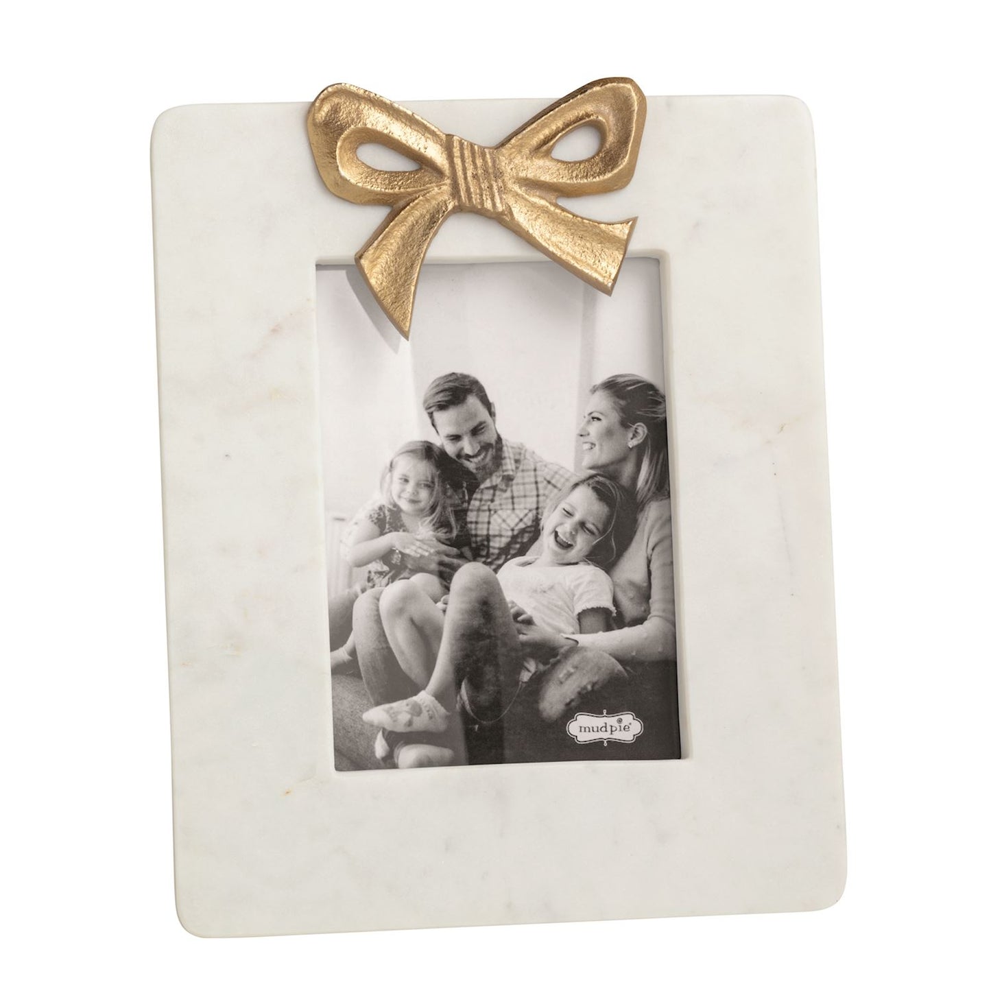 large white marble frame with gold bow and black and white picture in it