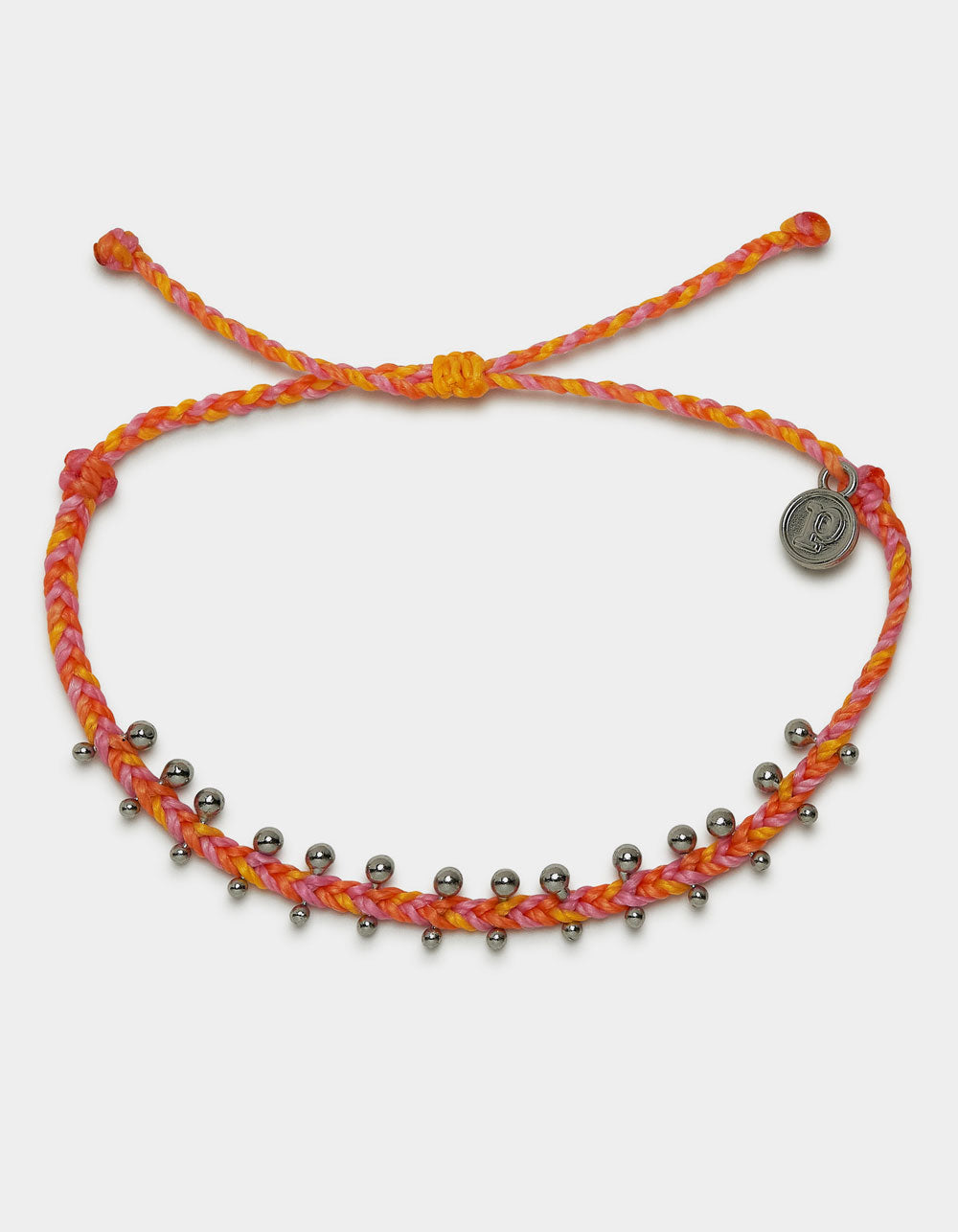 Pura Vida braided bracelet in varying shades of orange and pink and silver beads with a Pura Vida logo charm
