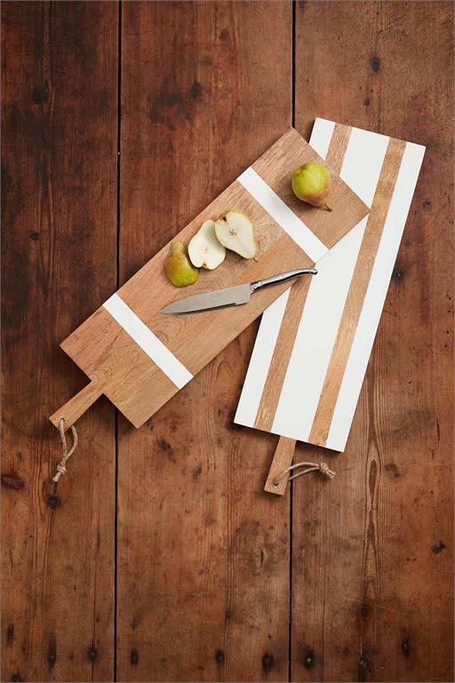 2 styles of white and wood boards overlapped on a a wooden table with cut pears on them.