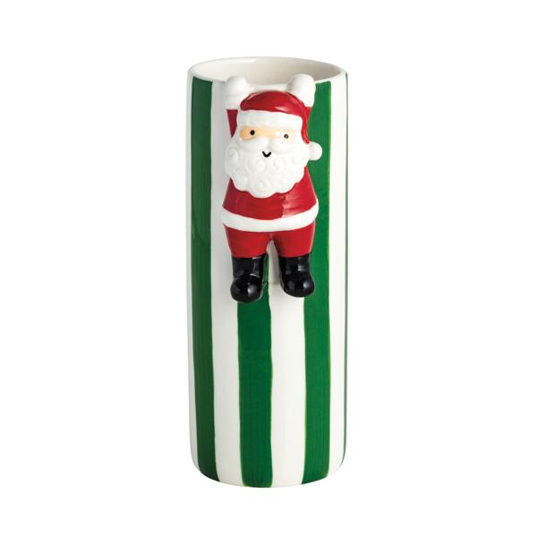 vase with green and white stripes and a Santa figure hanging on the rim