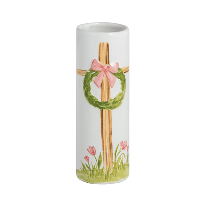 white cylinder vase with cross, wreath, and pink bow design painted on .