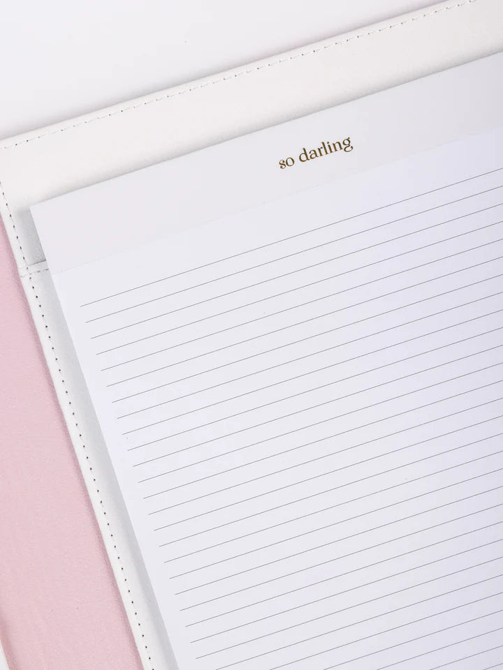 close-up of inside notepad with "so darling" printed at the top.