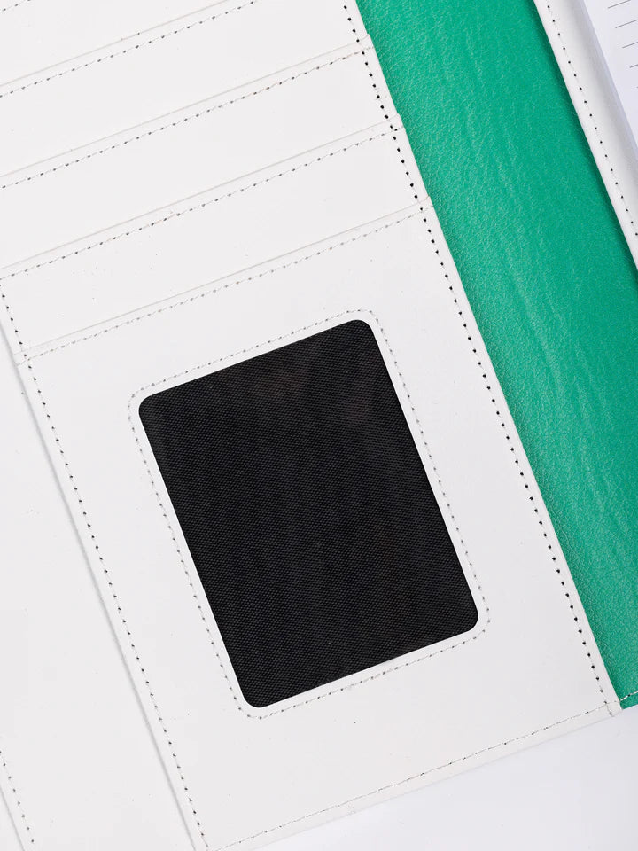 close-up of ID pocket and card slots inside folio.