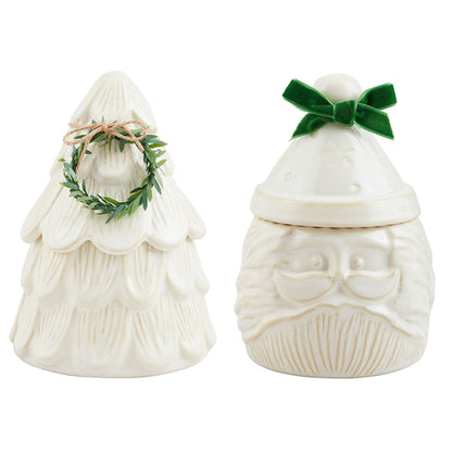 a tree shaped and Santa face shape canisters shown on a white background.