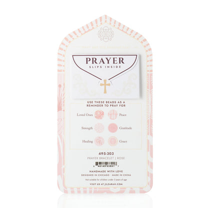 back view of card packaging for rose prayer braclet.
