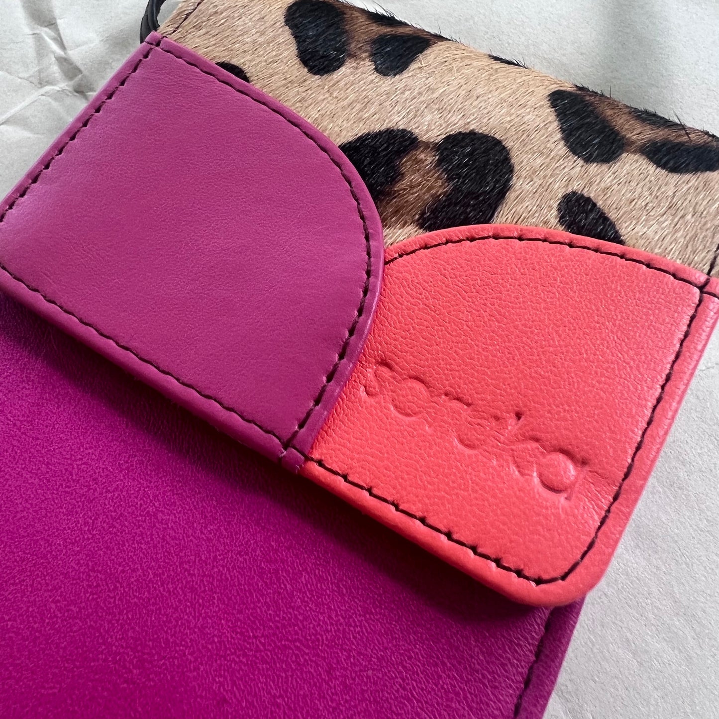close-up of fuchsia Miley Phone Bag