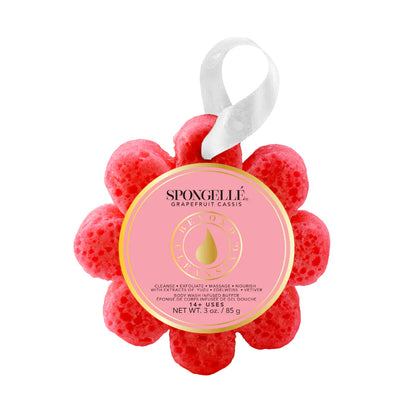 Red flower-shaped sponge with a pink label on a white background