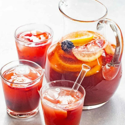 pitcher and glasses filled with Glitter Sangria 