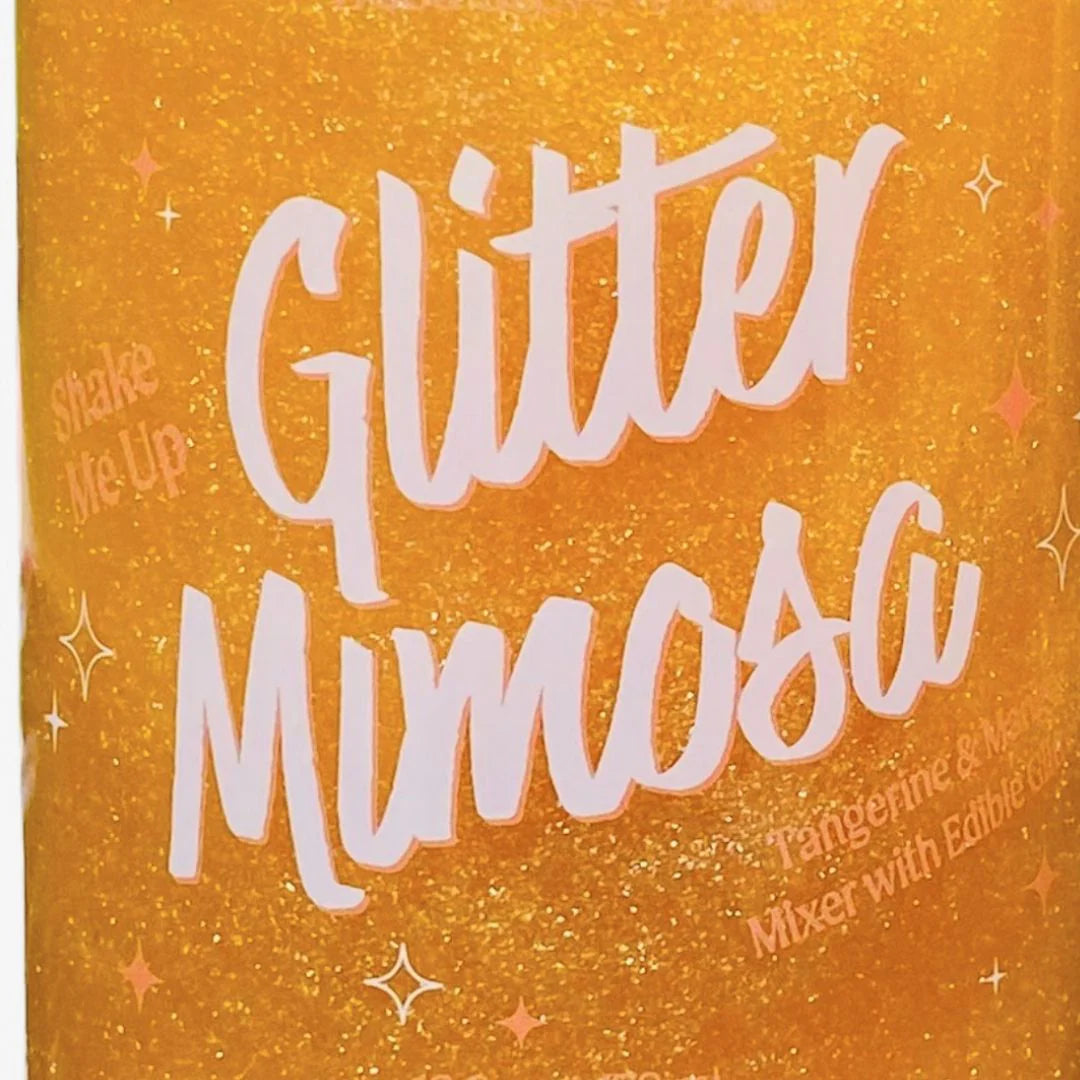close-up of bottle of Glitter Mimosa Mixer