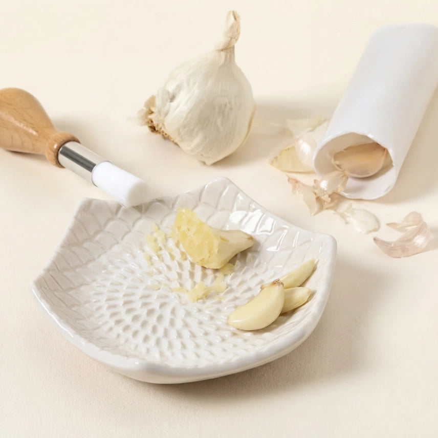 3 piece white grate plate set on a cream counter