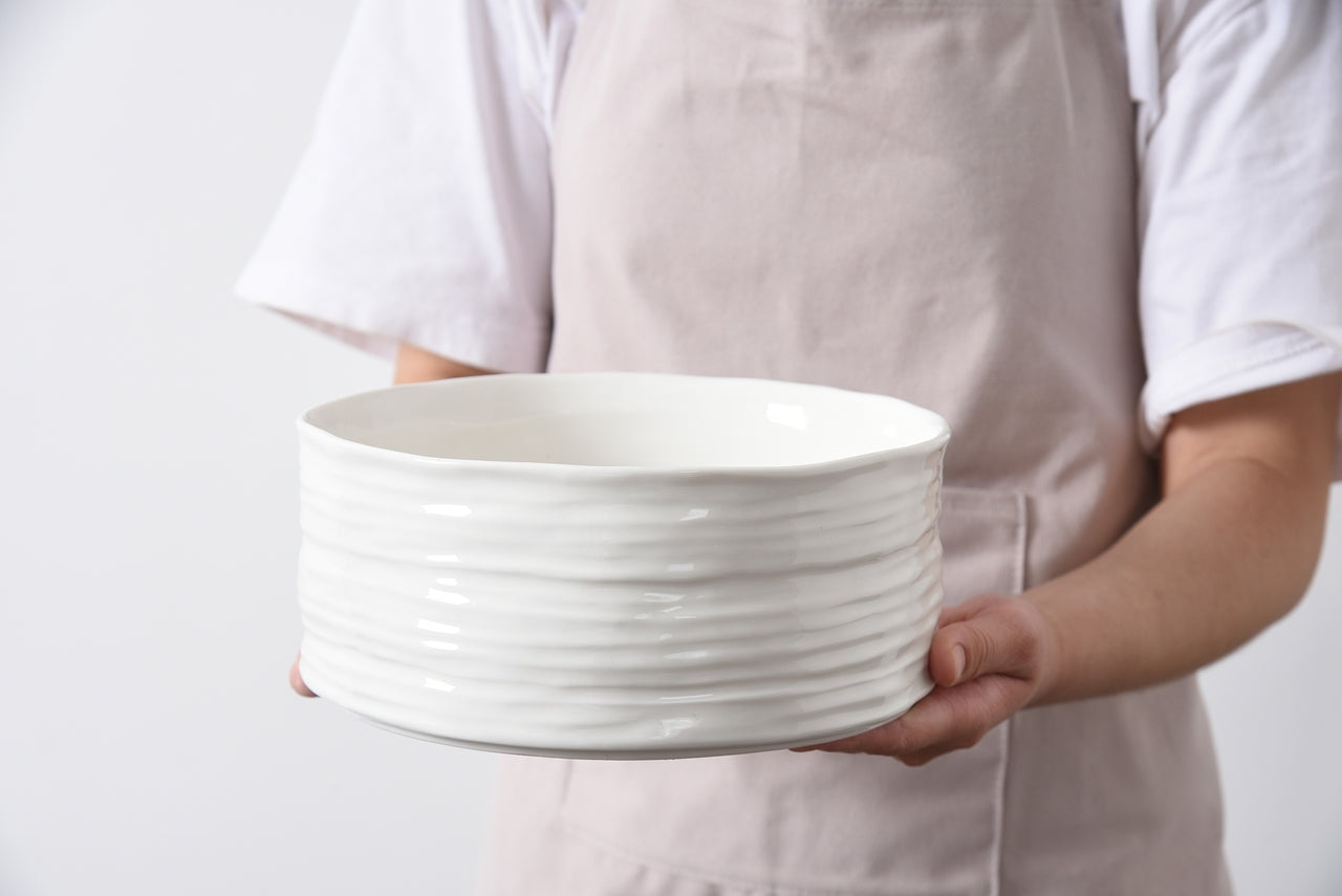 person holding the le blank meduim bowl