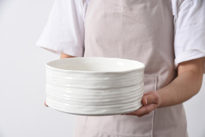 person holding the le blank meduim bowl