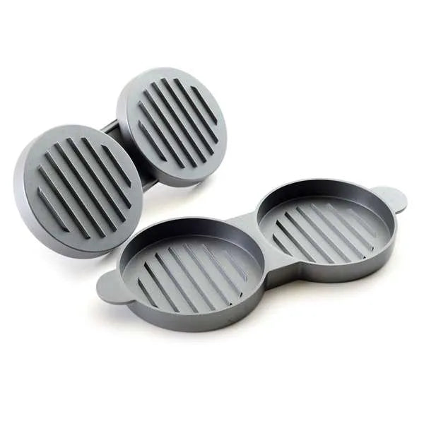 Double burger press with lid flipped over and sat next to it showing grill lines on the interior