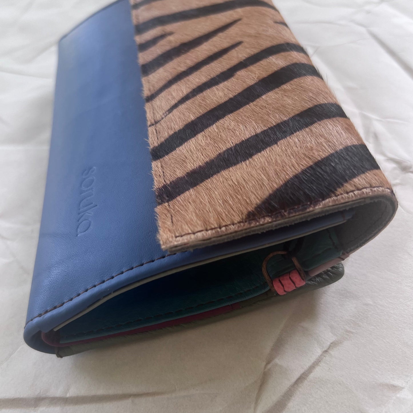 side view of cerulean Amelia Clutch Wallet