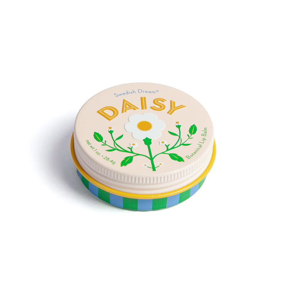 tin of daisy lip balm with off white lid and blue and green striped base