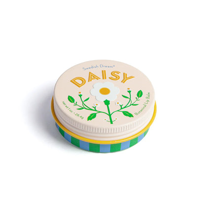 tin of daisy lip balm with off white lid and blue and green striped base