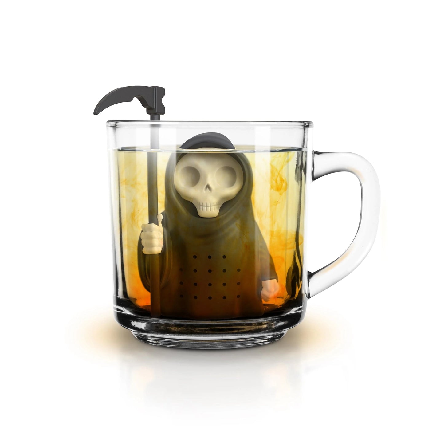 Grim Steeper Tea Infuser in a clear glass steeping tea.