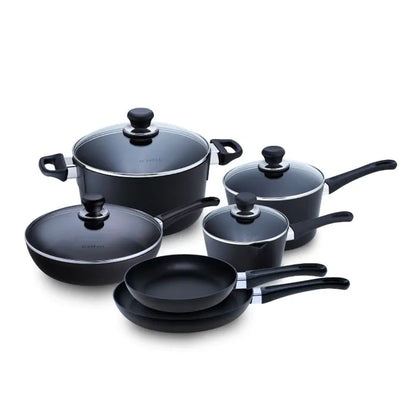 A 10 piece cookware set by ScanPan, including pots and pans with lids, in black color, some with lids, arranged on a white background