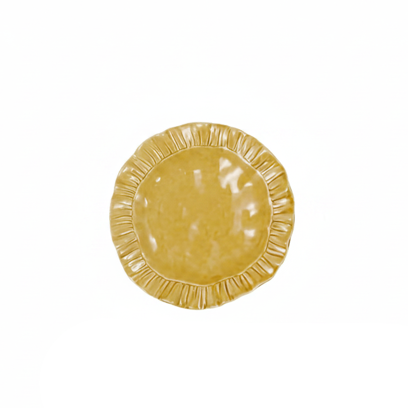mustard yellow ruffle salad plate on a white background