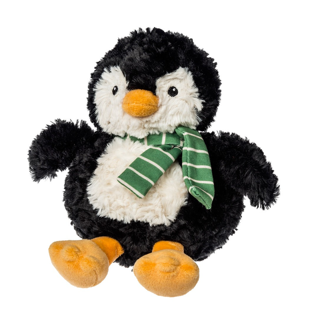 Plush penguin toy with a green scarf on a white background