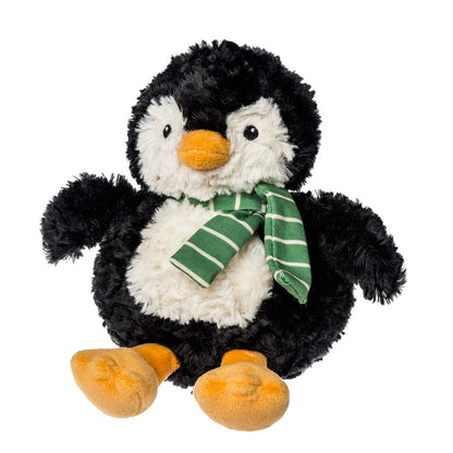 Plush penguin toy with a green scarf on a white background