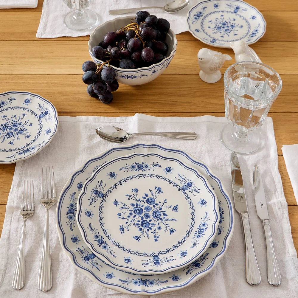 costa nova vila blue and white placeletting on a set table