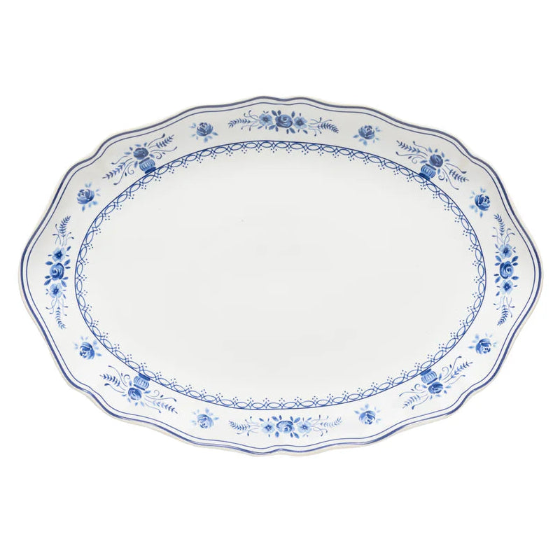 White oval platter with blue floral patterns on a white background