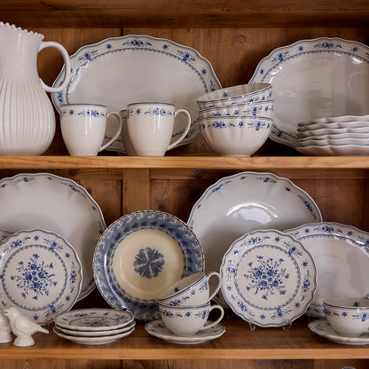 vila blue and white pattern in a hutch with various other dishes