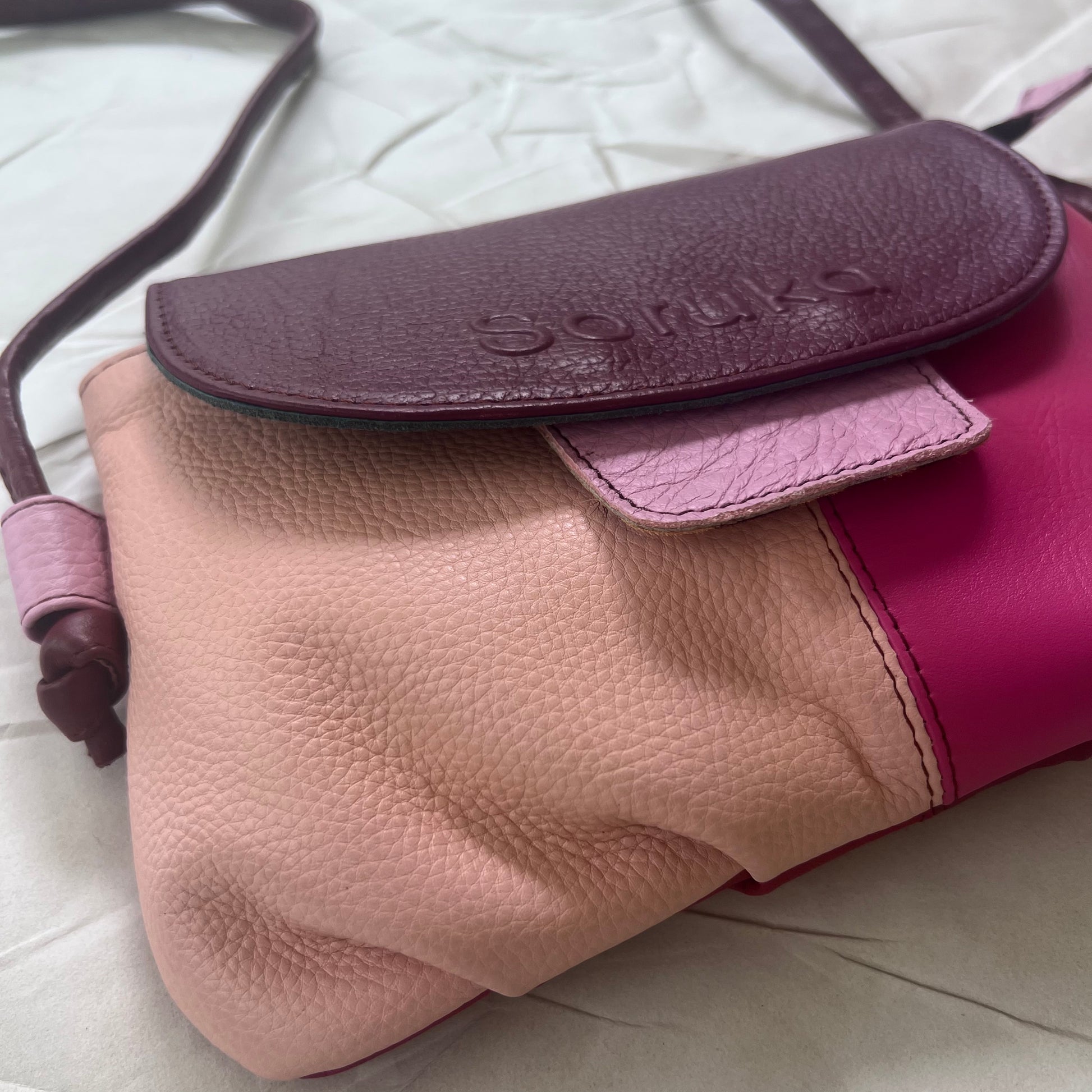 bottom view of bubblegum Gianna Crossbody Purse