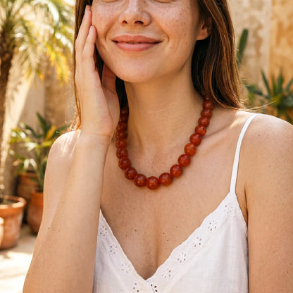a person wearing the chunky beaded necklace
