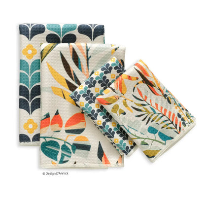 Colorful leaves all purpose towel set, folded and arranged on a white background.