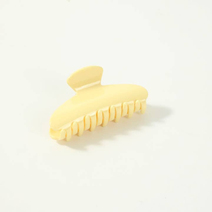 butter yellow Hair Claw Clip on a white background