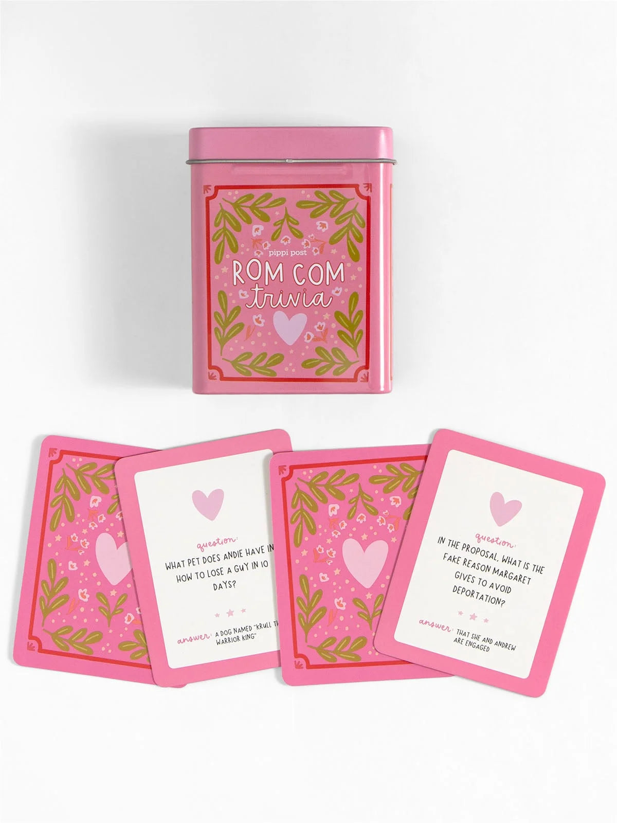 rom com trivia tin and cards on a white background