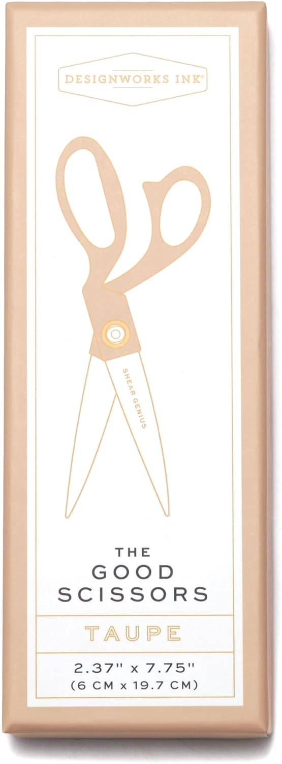 Box of 'The Good Scissors' in taupe color with brand name on a white background