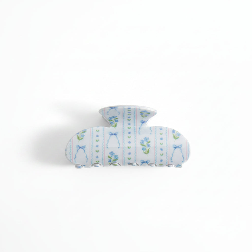 Blue Floral & Coqeutte Bows Claw Hair Clip on a white background