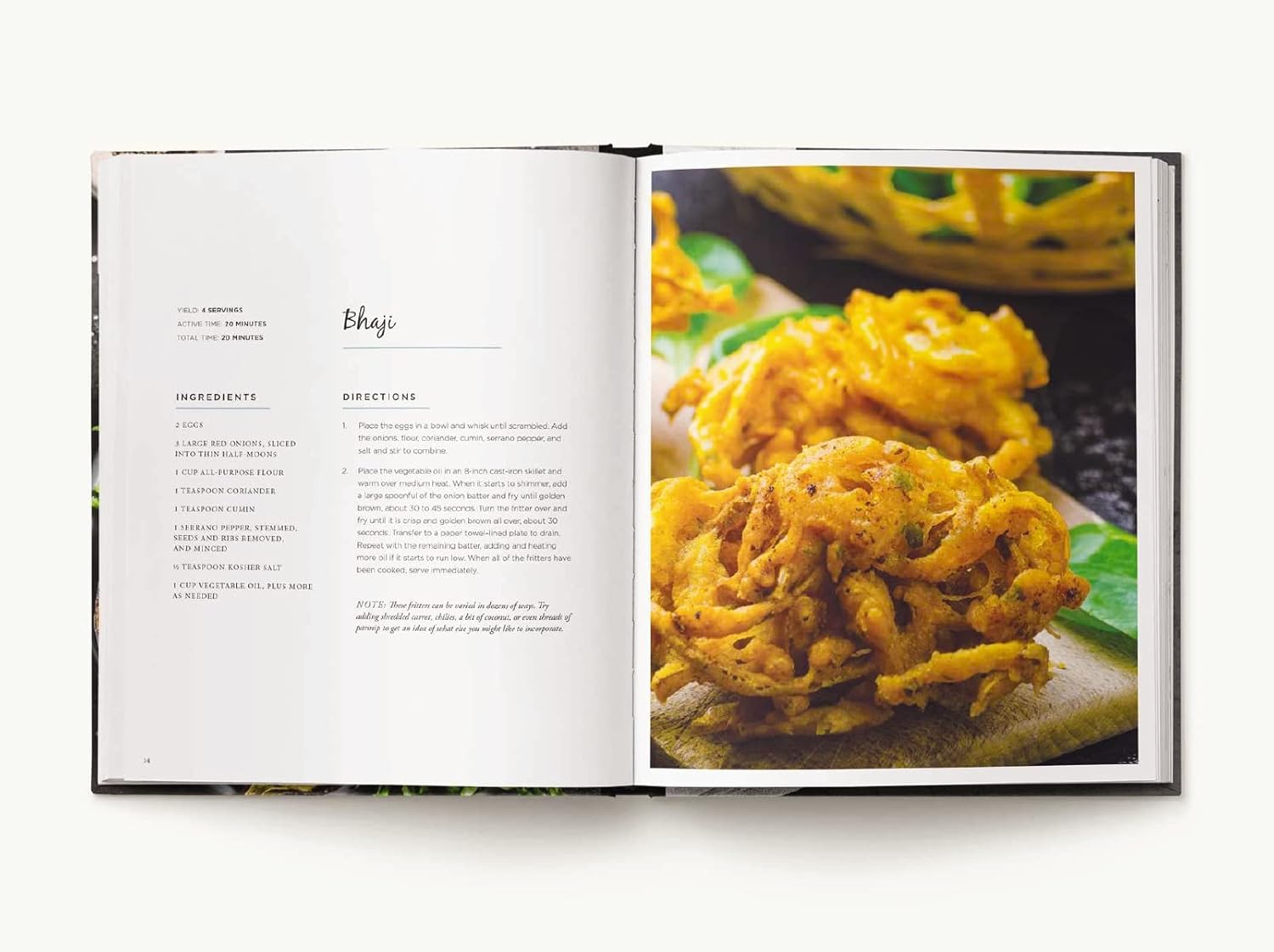 Open cookbook showing a recipe for bhaji with a photograph of the dish on a white background