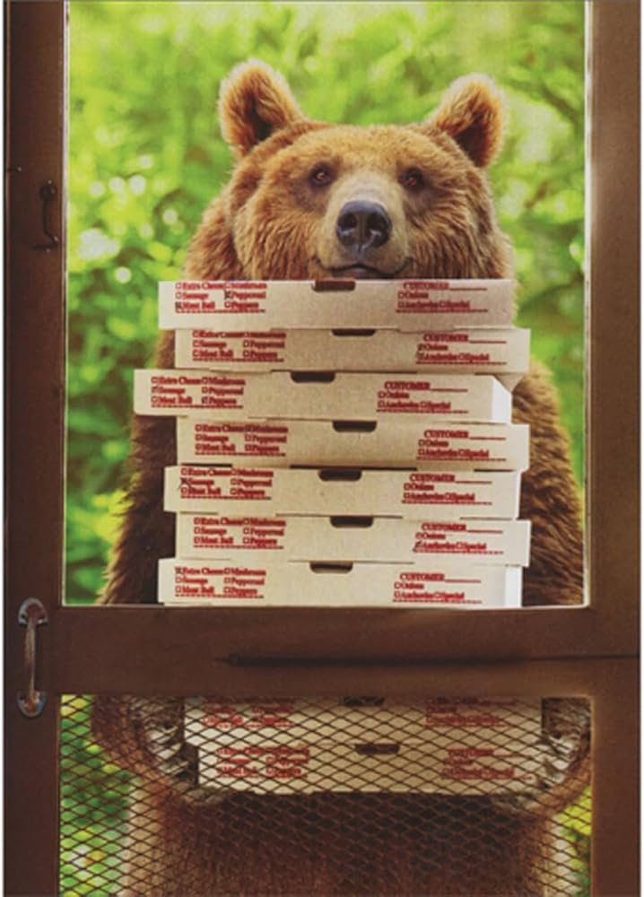 front of card is a brown bear holding a stack of pizza boxes outside a screen door